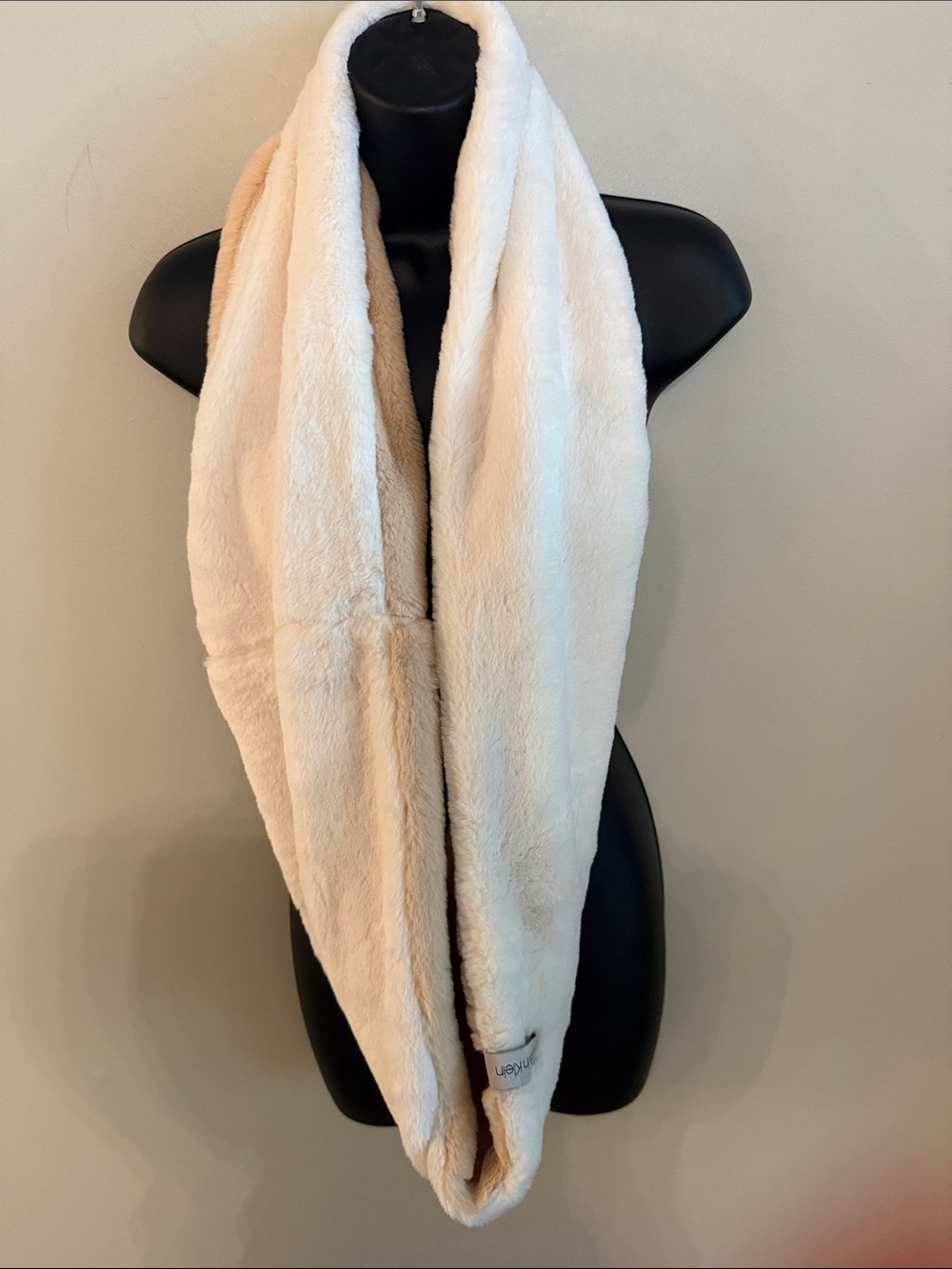 Calvin Klein Cream Plush Infinity Scarf with Blush Rose color inside